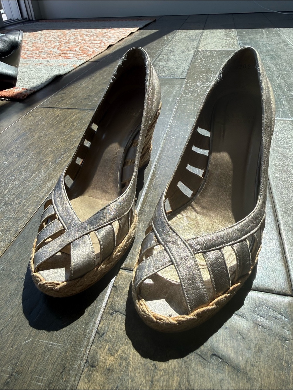 Stuart Weitzman metallic gold wedge espadrille sandles